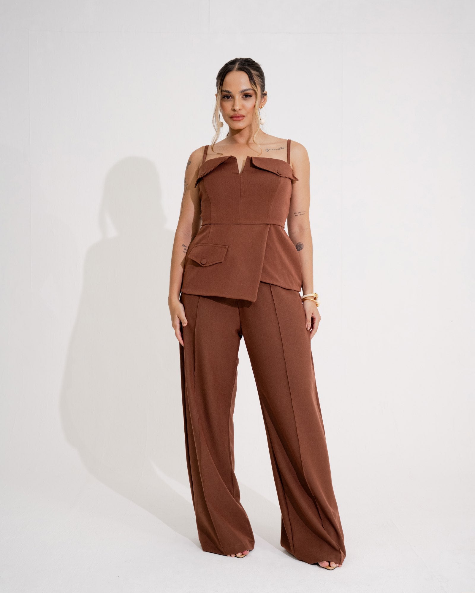 BLUSA PEPLUM ASSIMÉTRICO COM LAPELAS